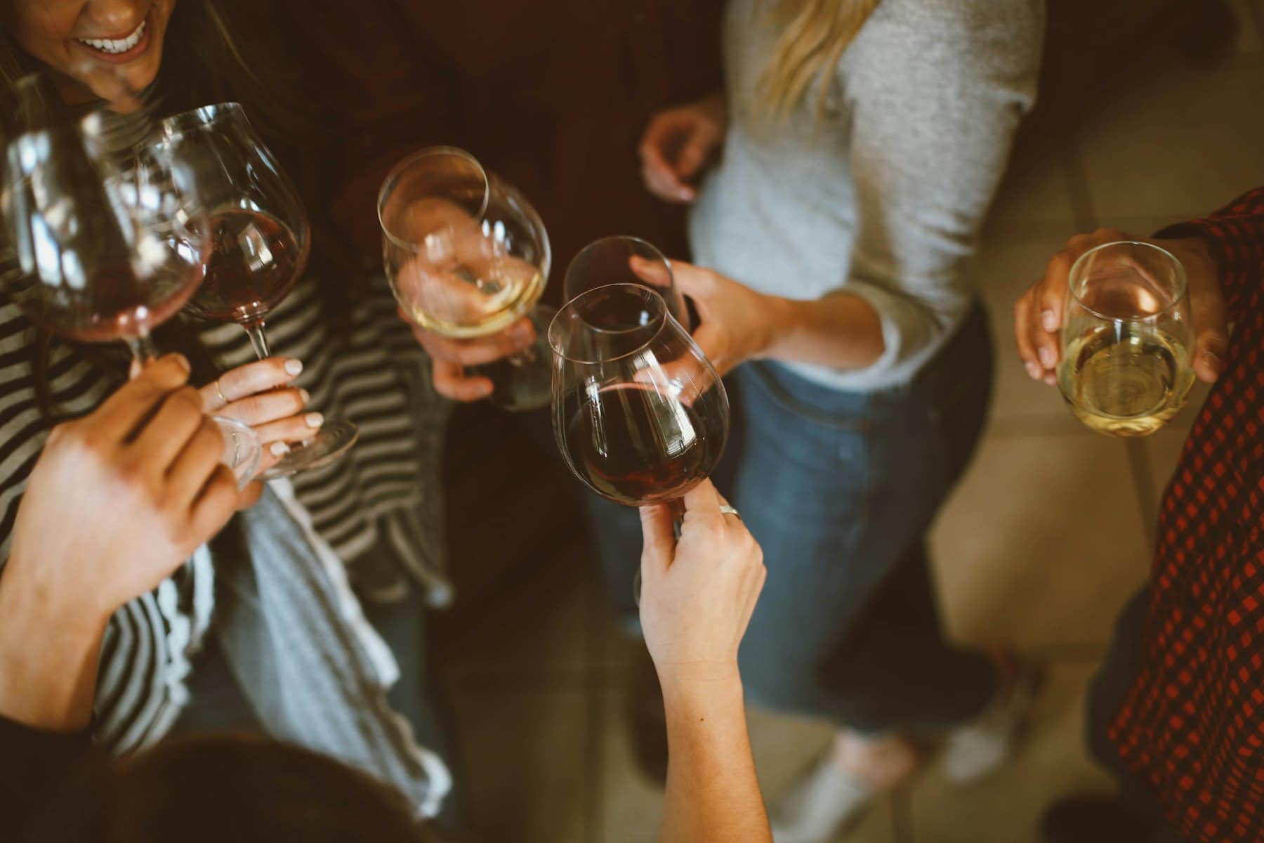Friends raising glasses at a celebration